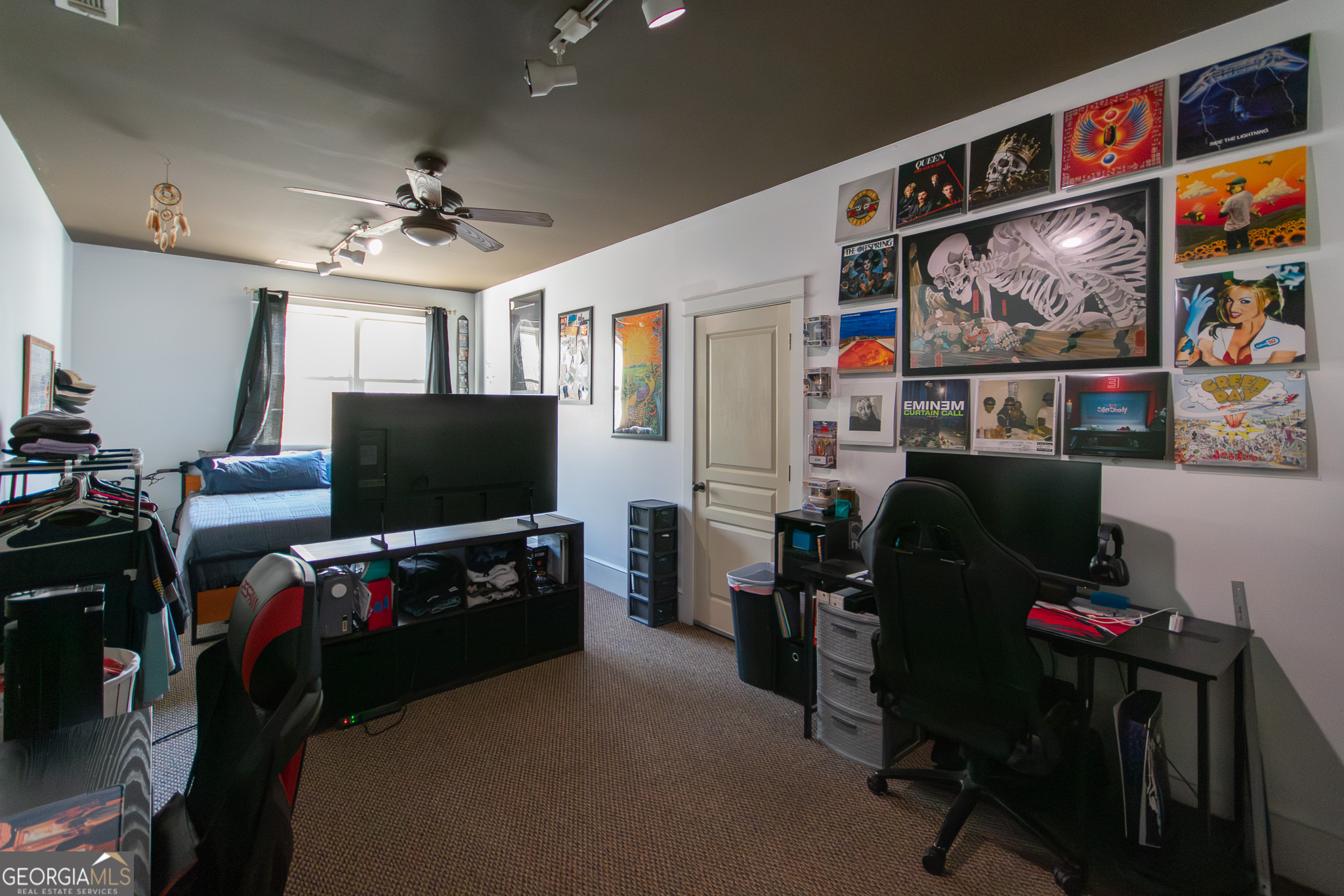 190 Carl Williams Road Senoia, GA 30276 - Photo 42 of 93 a living room with furniture and a flat screen tv