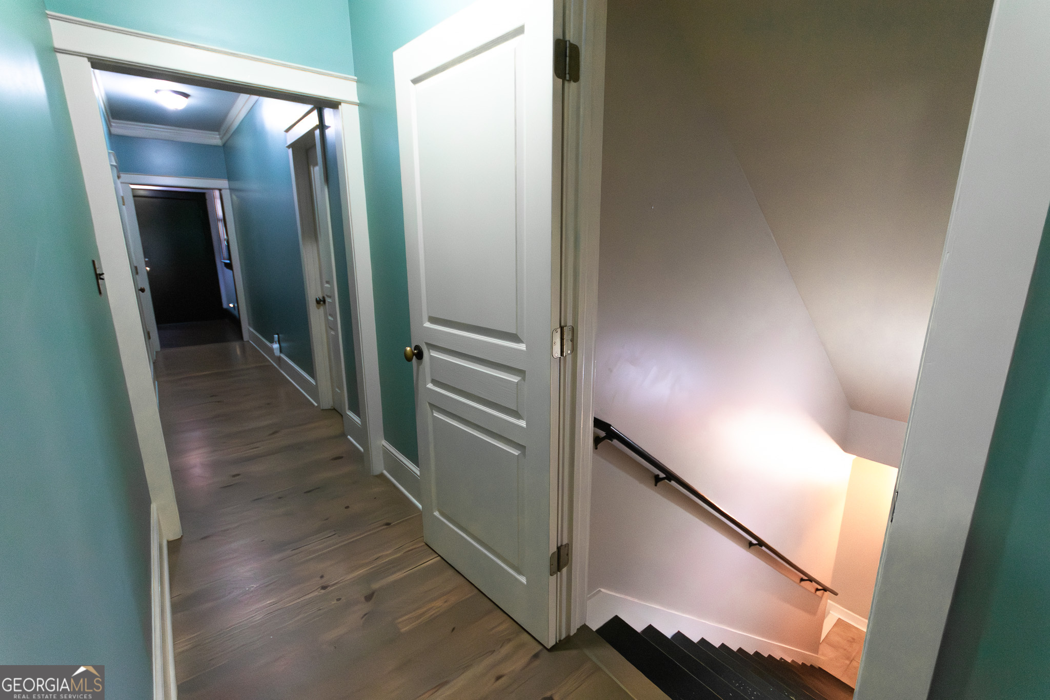 190 Carl Williams Road Senoia, GA 30276 - Photo 46 of 93 a view of a hallway with wooden floor and staircase