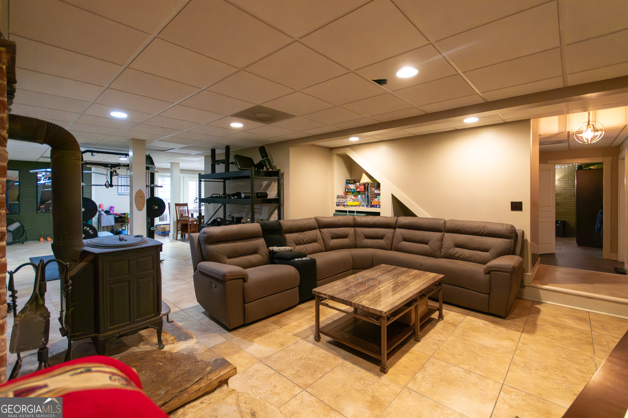 190 Carl Williams Road Senoia, GA 30276 - Photo 47 of 93 a living room with furniture and a flat screen tv