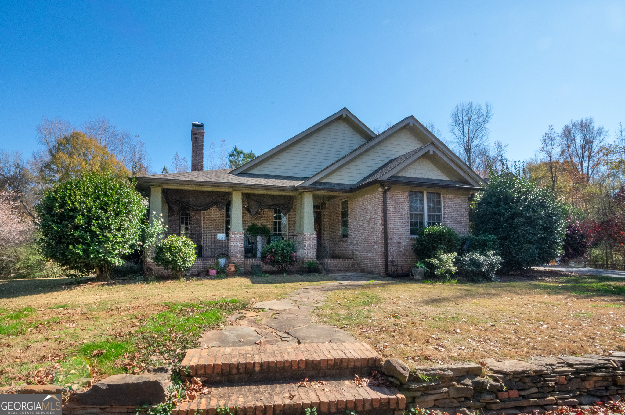 190 Carl Williams Road Senoia, GA 30276 - Photo 5 of 93 a front view of a house with a yard