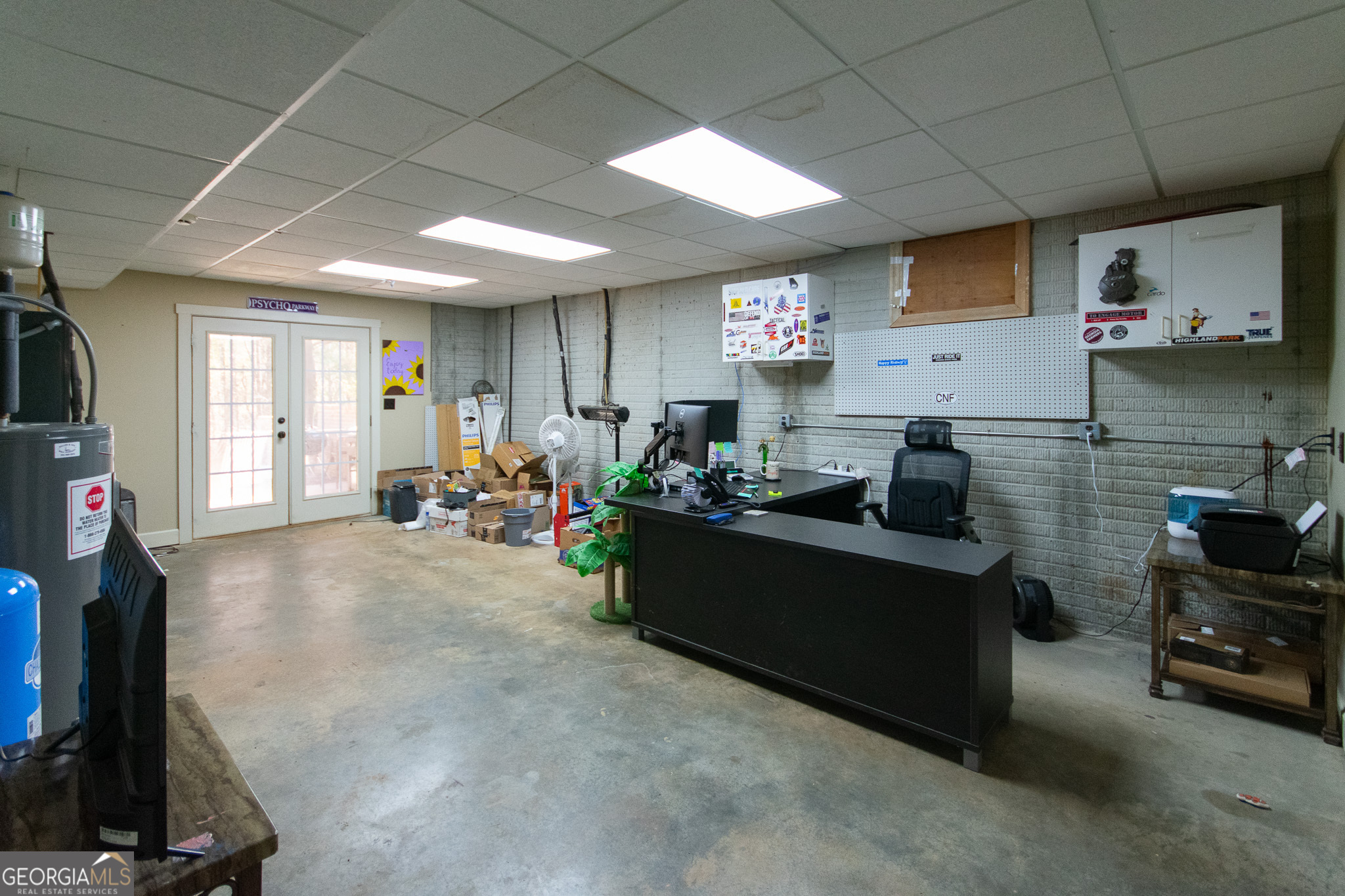 190 Carl Williams Road Senoia, GA 30276 - Photo 66 of 93 a room with furniture and a flat screen tv