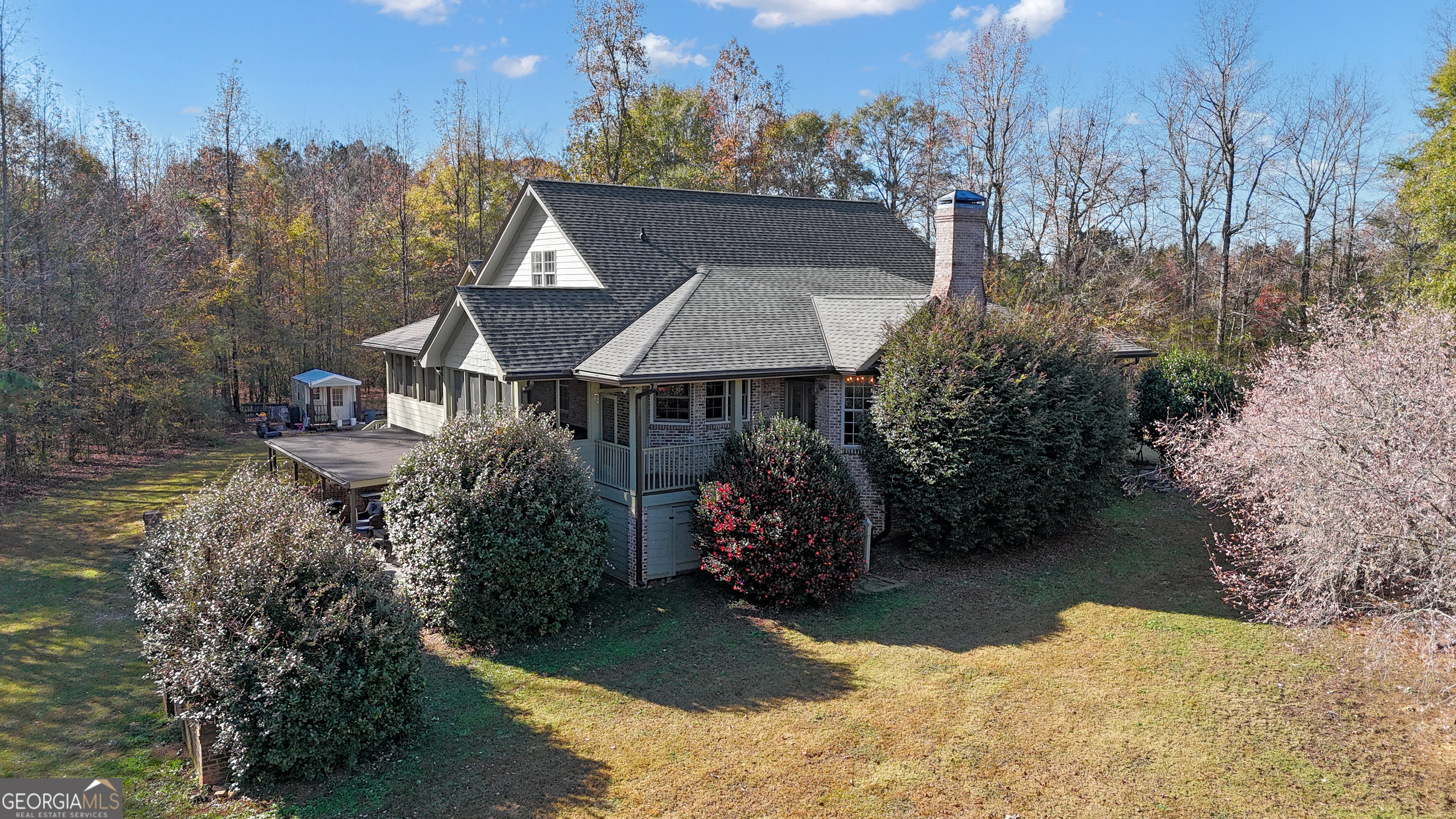 190 Carl Williams Road Senoia, GA 30276 - Photo 8 of 93 a front view of house with yard and trees in the background