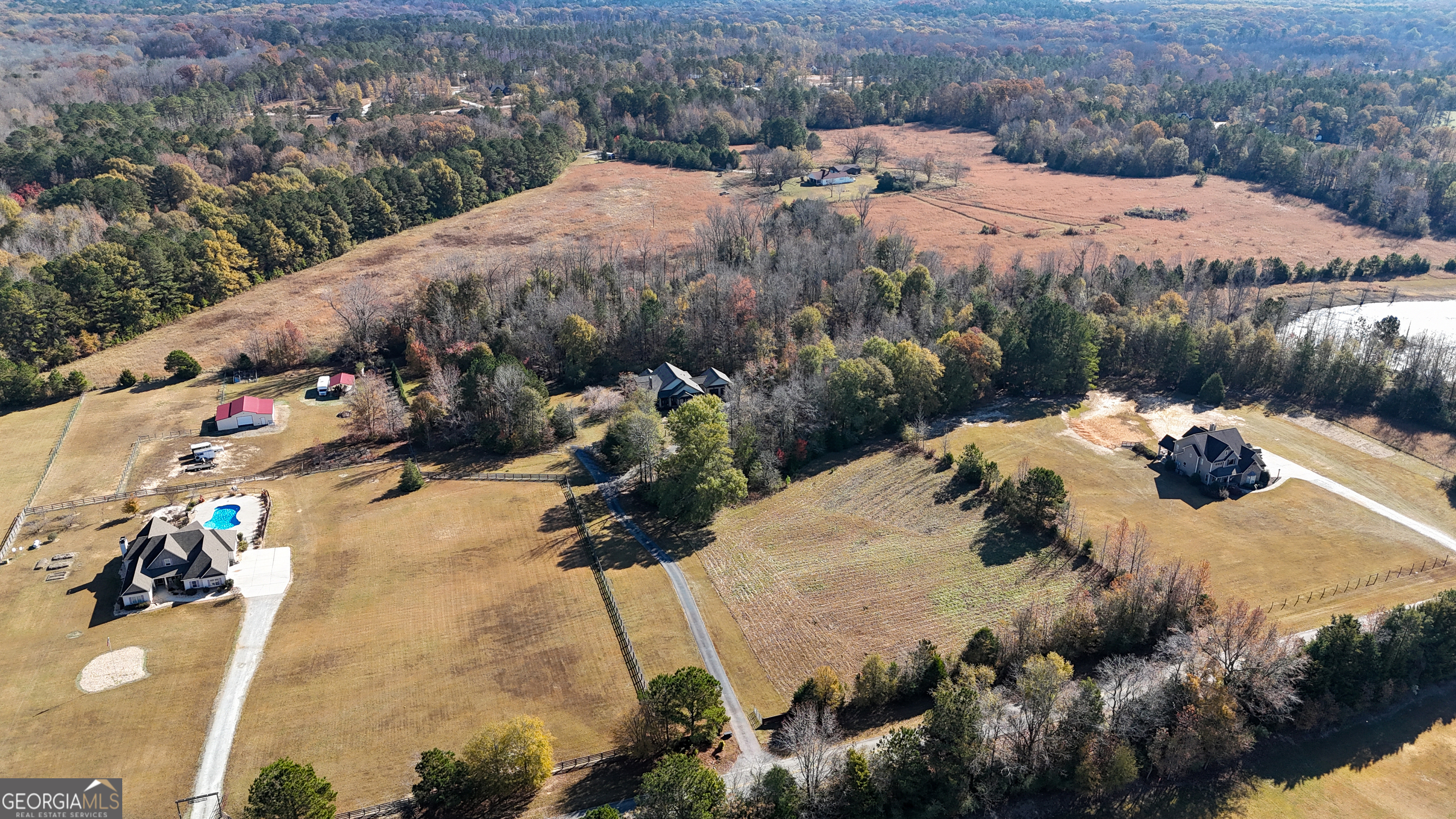 190 Carl Williams Road Senoia, GA 30276 - Photo 90 of 93 a view of a houses and mountains in the background