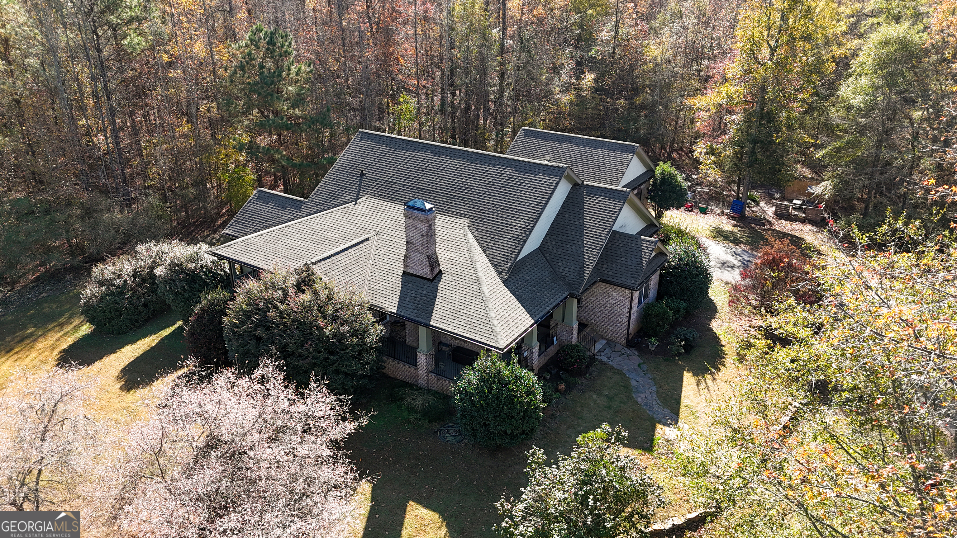 190 Carl Williams Road Senoia, GA 30276 - Photo 9 of 93 a aerial view of a house with a yard and potted plants