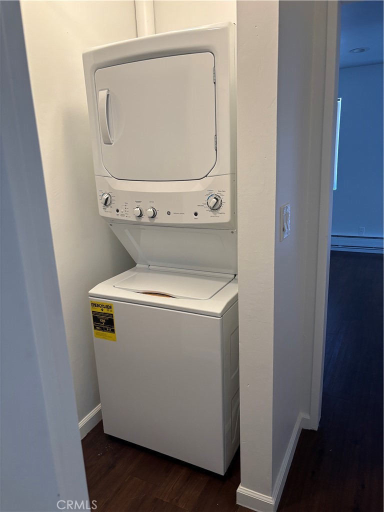 14718 Magnolia Boulevard, Unit 7 Sherman Oaks, CA 91403 - Photo 4 of 5 a utility room with dryer and washer