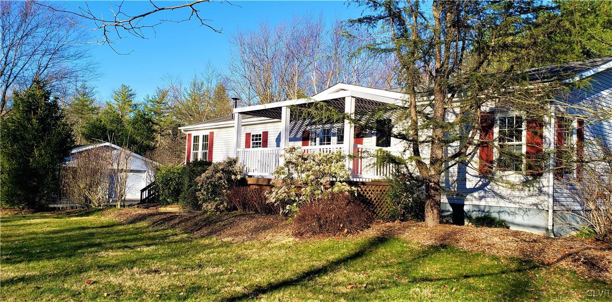 3087 Cooks Creek Road Riegelsville, PA 18077 - Photo 1 of 1 a front view of house with yard and trees