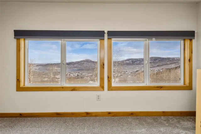 a bathroom with a bathtub and window
