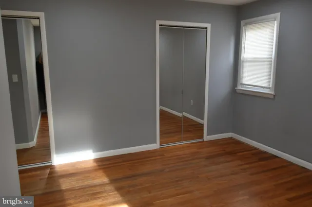 a view of a room that has a window in it