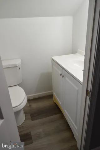 a backyard of a house with wooden fence