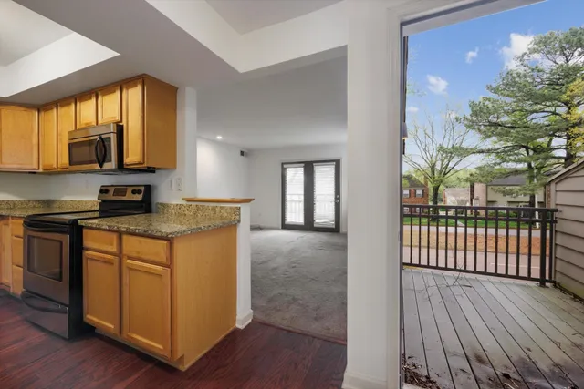 a view of wooden balcony with a pot