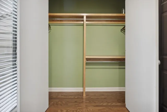 a view of empty room with a fireplace