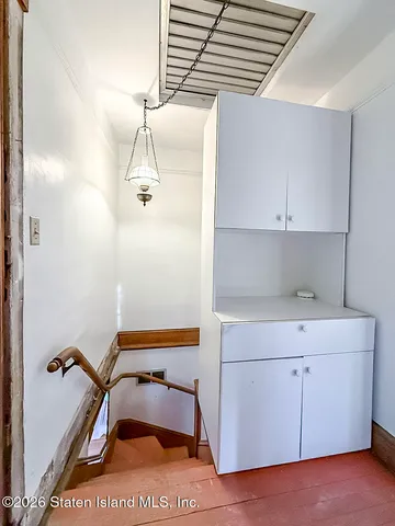a bathroom with a sink and mirror