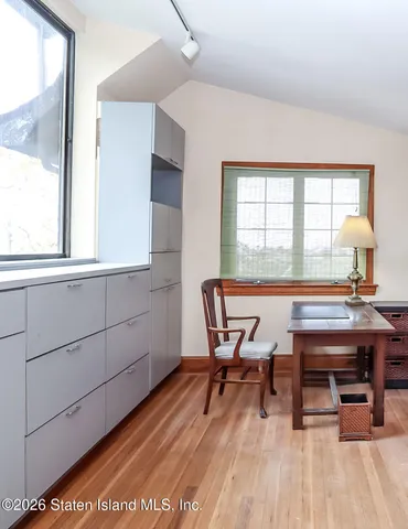 a workspace with wooden floor