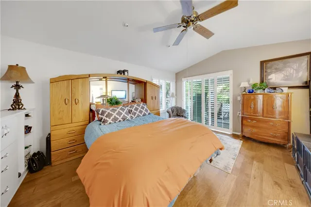 a bed room with a bed and a window