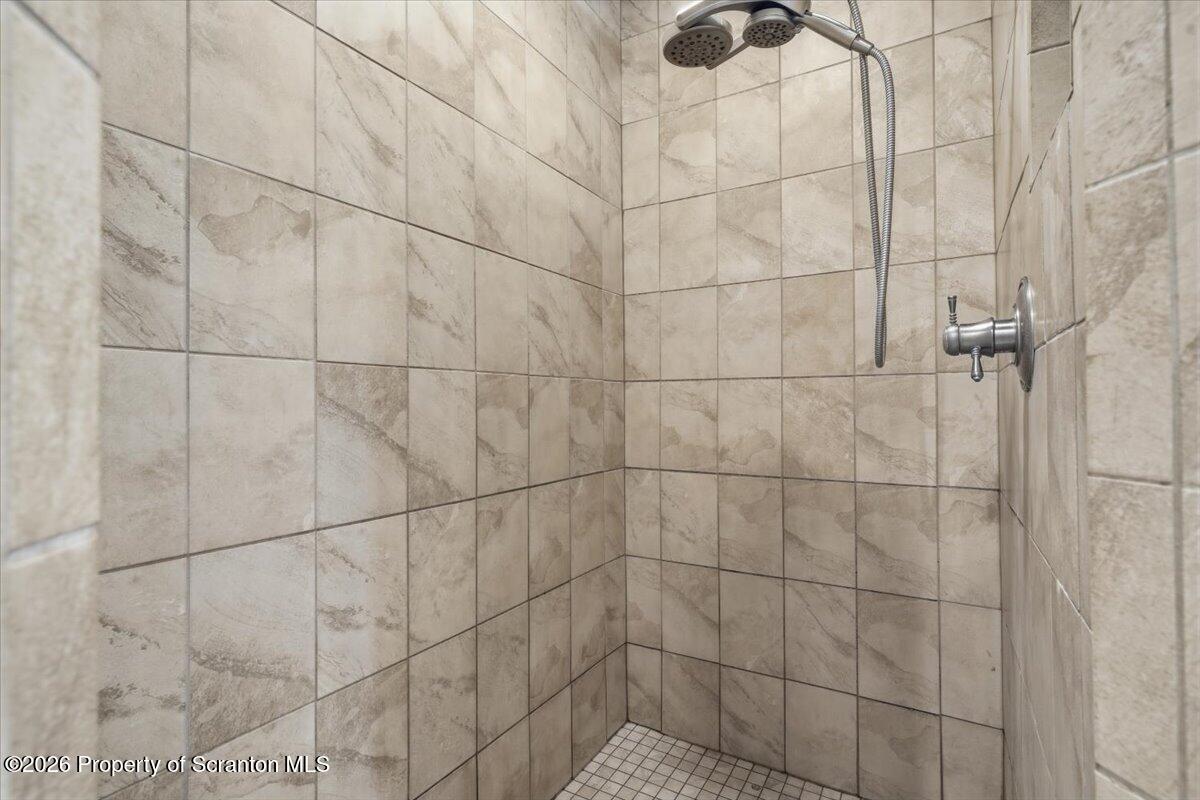 99 Hilltop Road Waverly, PA 18471 - Photo 29 of 41 a bathroom with a shower