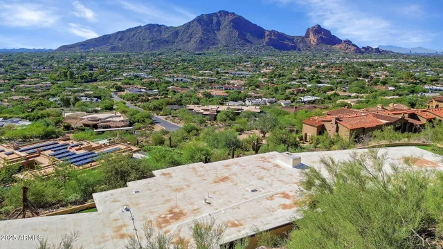 a view of a house with a mountain