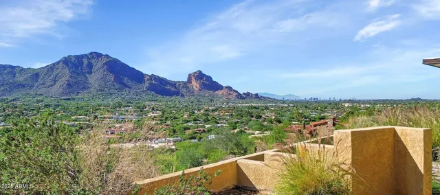 a view of a lake with a mountain in the background