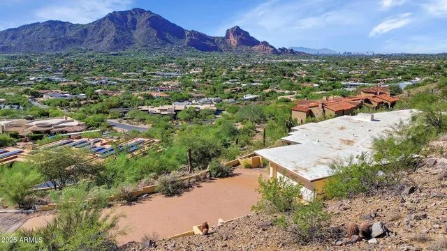 a view of a city with mountain