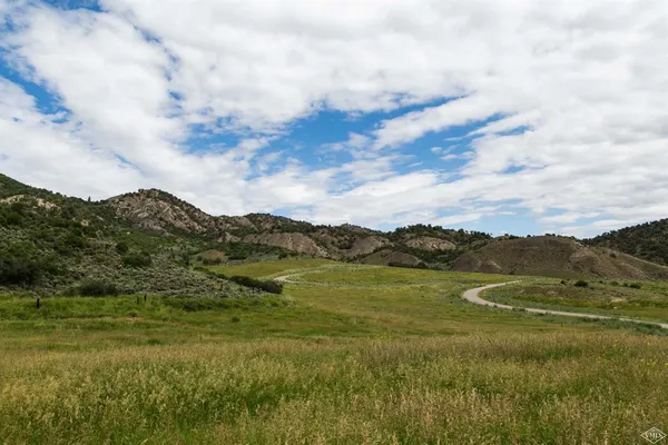 a view of lake with mountain