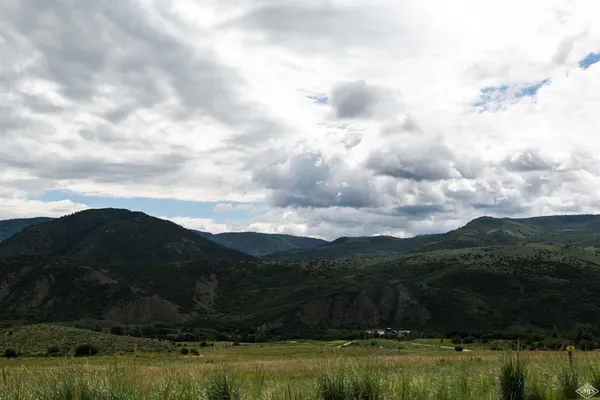 a view of mountains and river