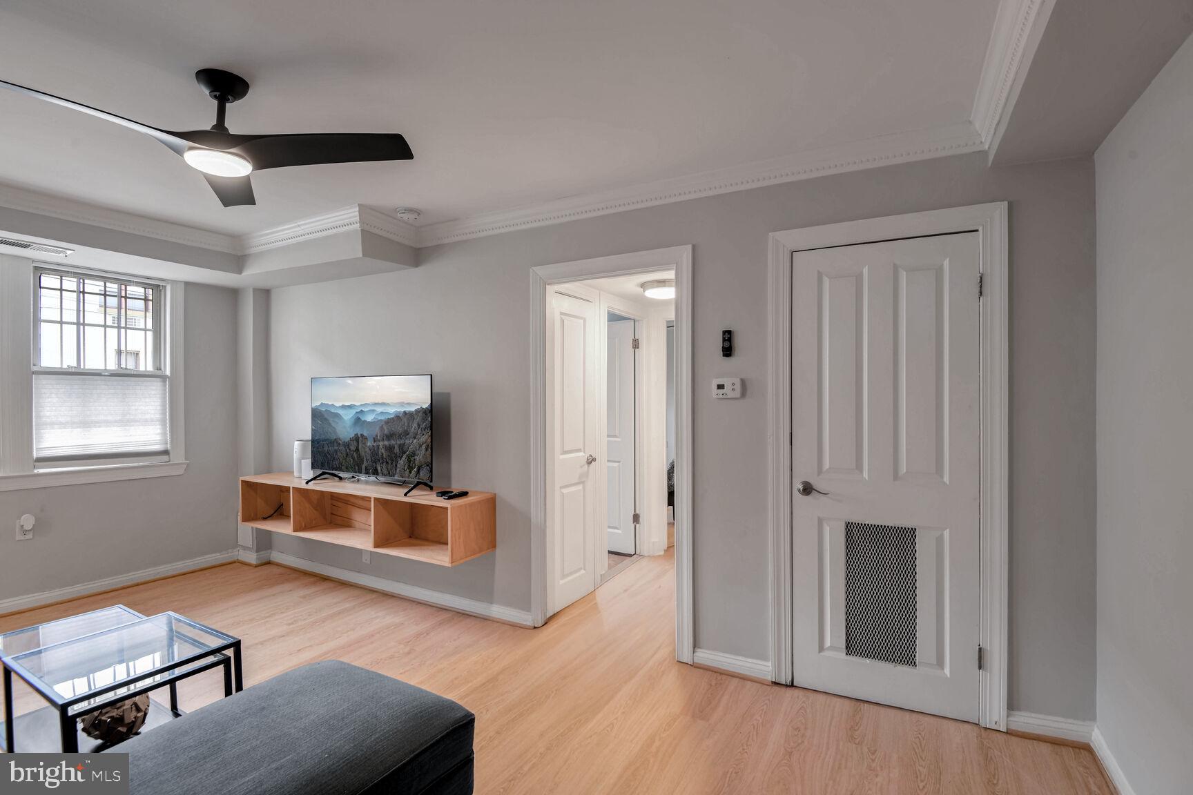 2625 3rd Street Northeast, Unit 105 Washington, DC 20002 - Photo 8 of 28 View down the hall leading to the bathroom and lar