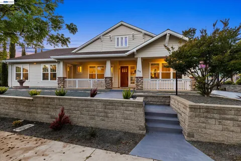 a front view of a house with entertaining space