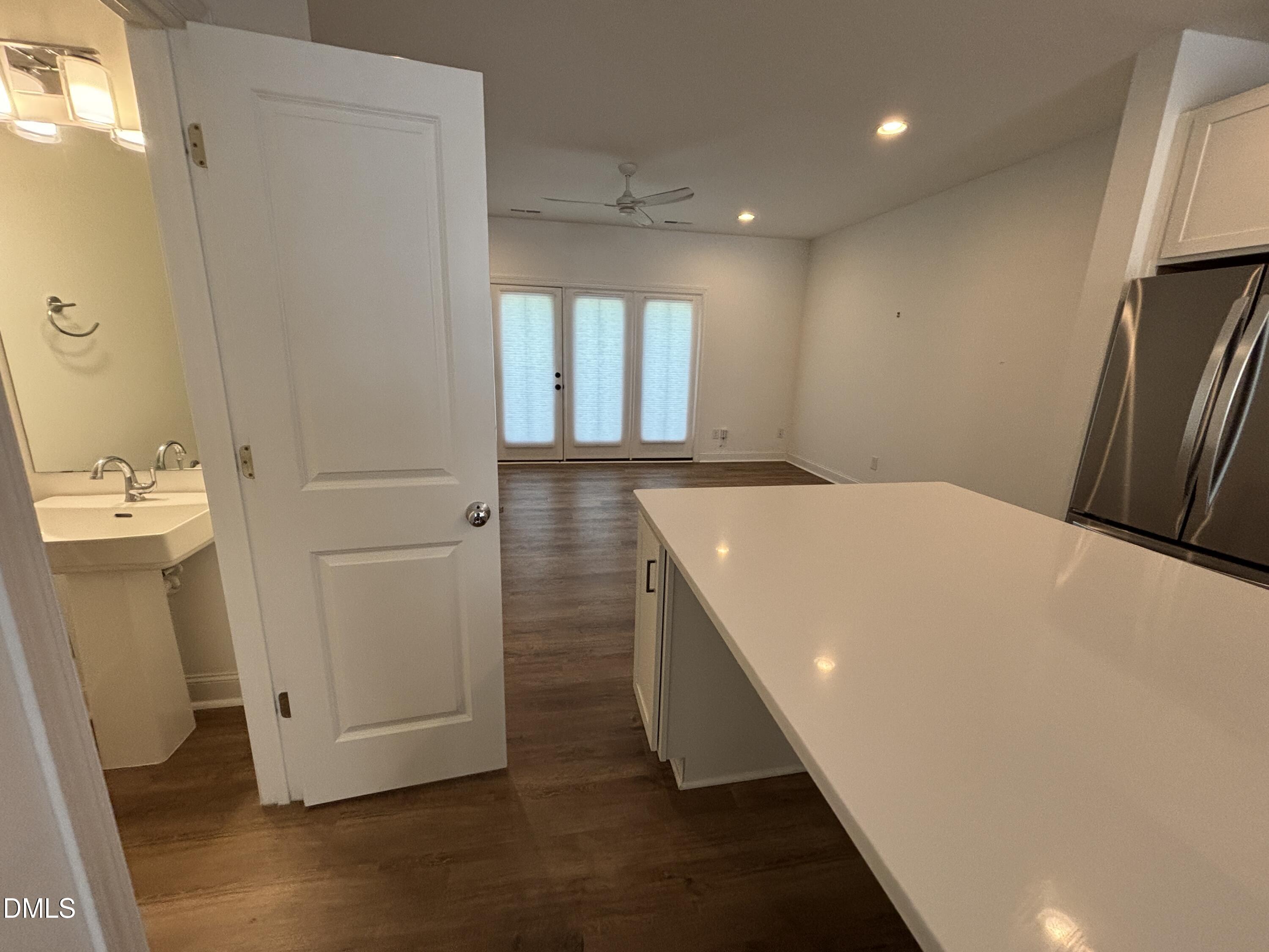 5710 Parker Pnes Court Raleigh, NC 27609 - Photo 26 of 78 a view of a hallway with washer and dryer