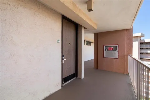 a view of a hallway with elevator
