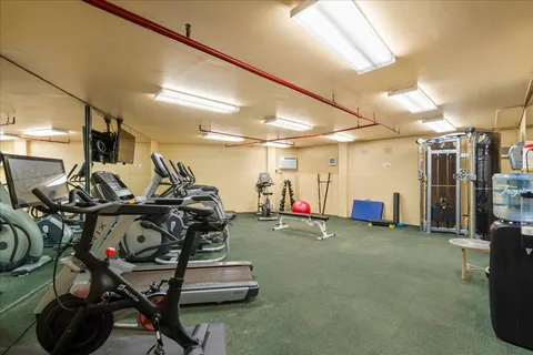 a view of a room with gym equipment