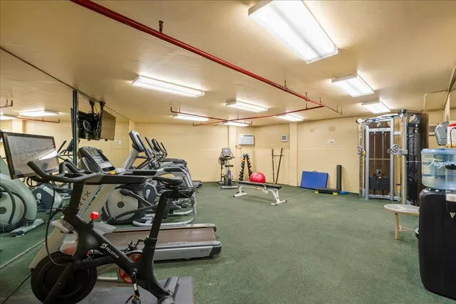 a view of a room with gym equipment