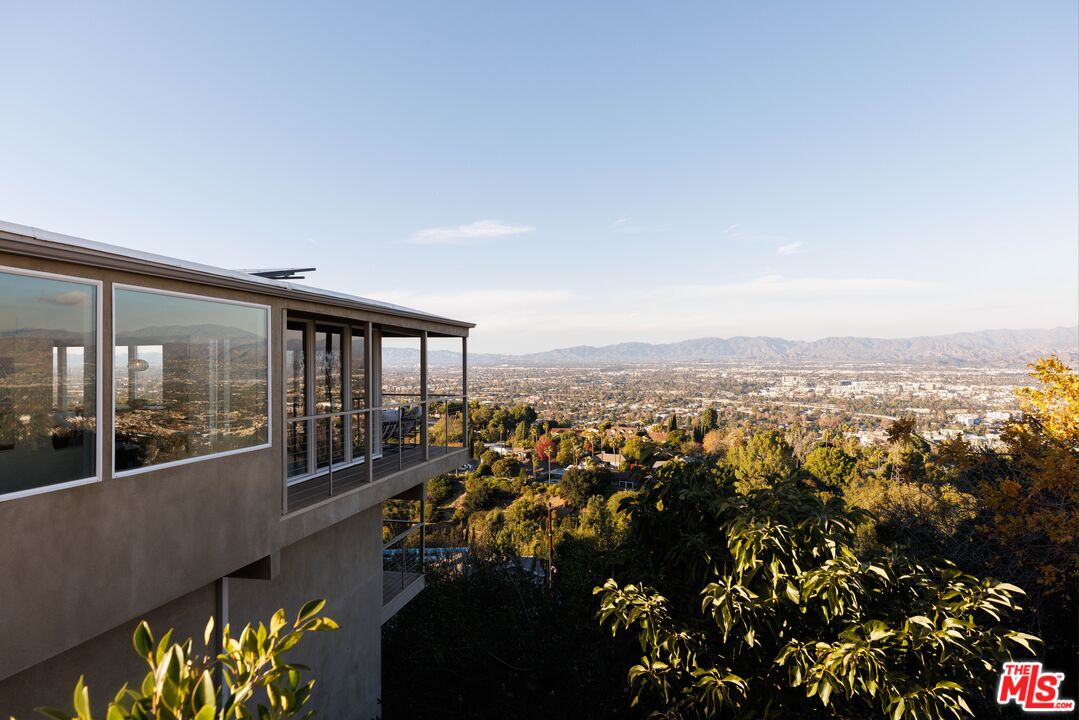 3272 Wrightwood Drive Studio City, CA 91604 - Photo 1 of 36 an outdoor view of a house with a porch