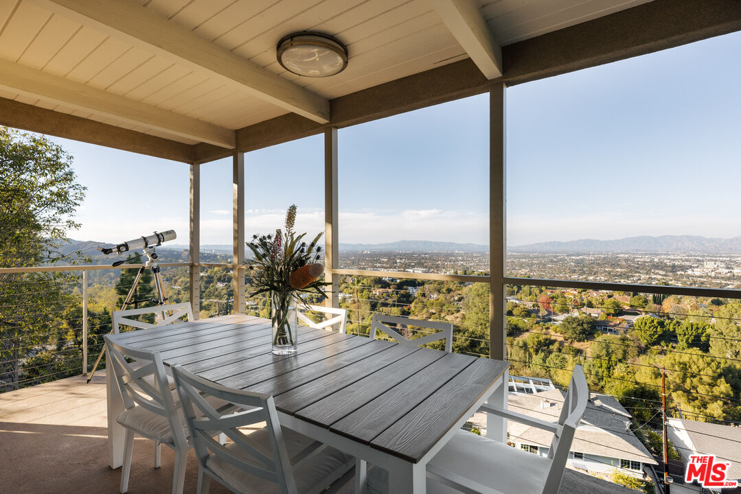 3272 Wrightwood Drive Studio City, CA 91604 - Photo 12 of 36 a view of a balcony with furniture