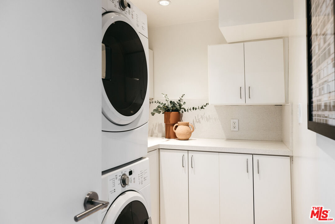 3272 Wrightwood Drive Studio City, CA 91604 - Photo 30 of 36 a close view of utility room with washer and dryer