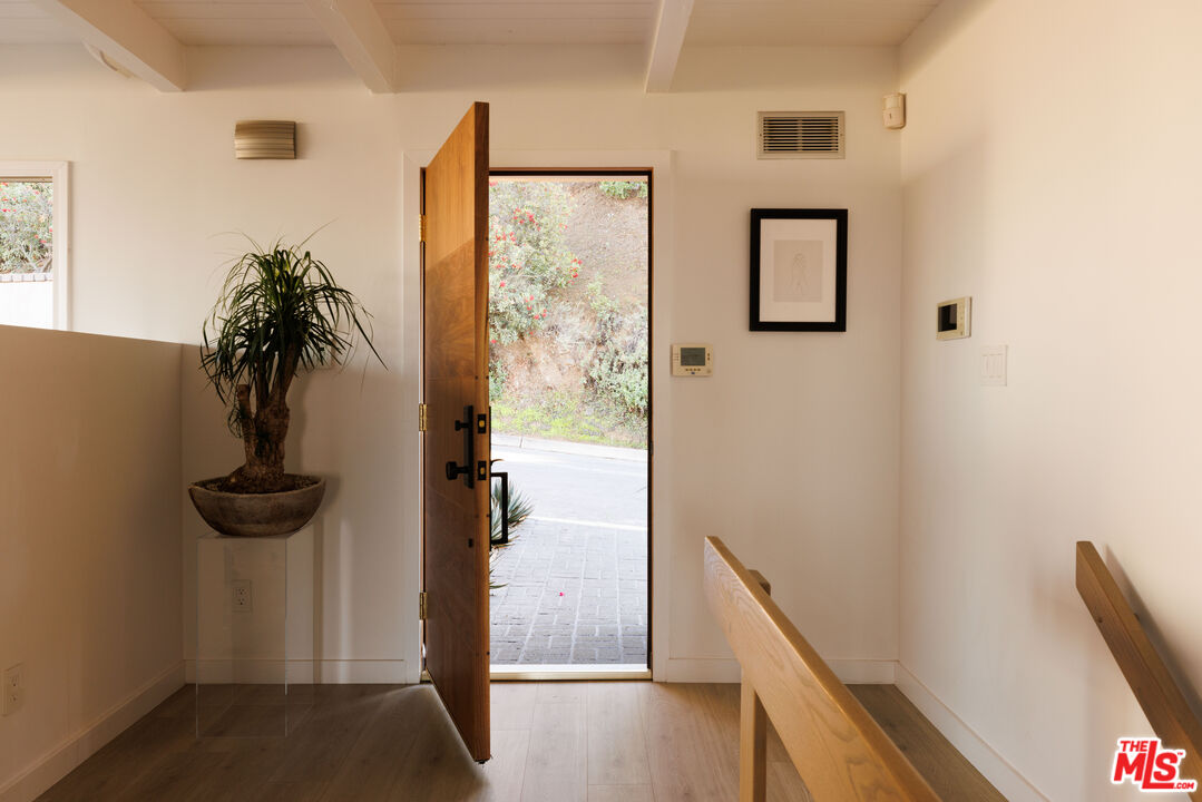 3272 Wrightwood Drive Studio City, CA 91604 - Photo 32 of 36 a view of hallway with furniture and a window
