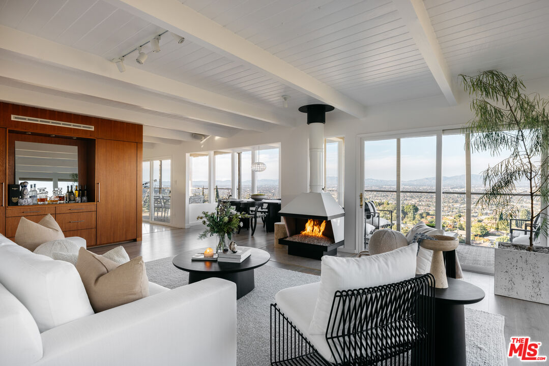3272 Wrightwood Drive Studio City, CA 91604 - Photo 4 of 36 a living room with furniture and a large window
