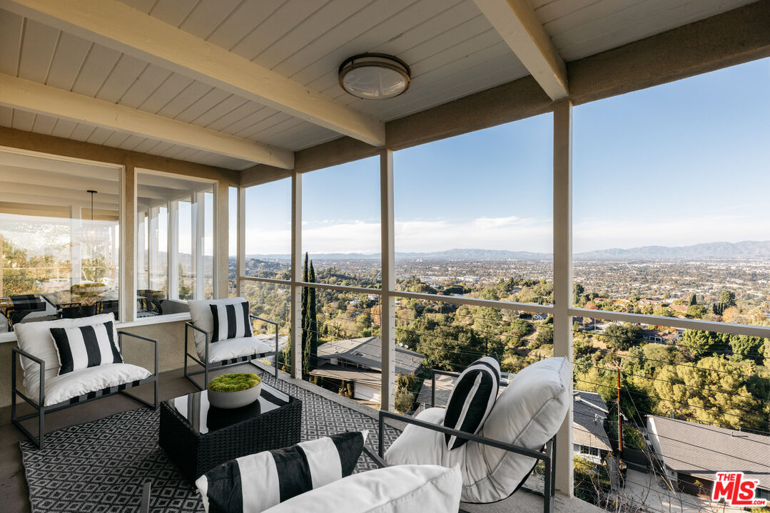 3272 Wrightwood Drive Studio City, CA 91604 - Photo 5 of 36 a view of living room with furniture and floor to ceiling window