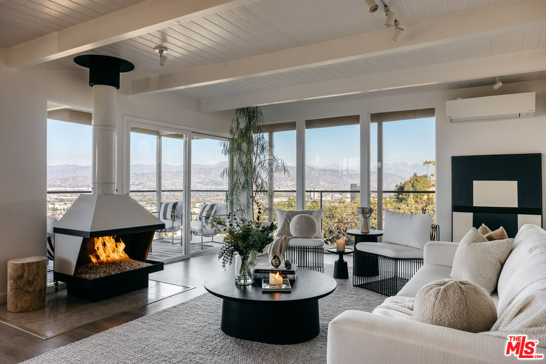 3272 Wrightwood Drive Studio City, CA 91604 - Photo 6 of 36 a living room with furniture and a floor to ceiling window