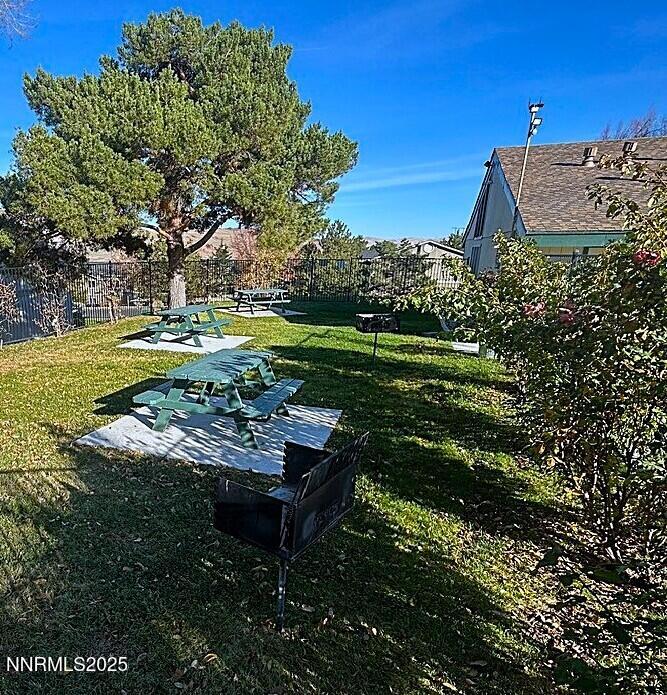3927 Clear Acre Lane, Unit 207 Reno, NV 89512 - Photo 33 of 33 a view of a park with plants and a bench