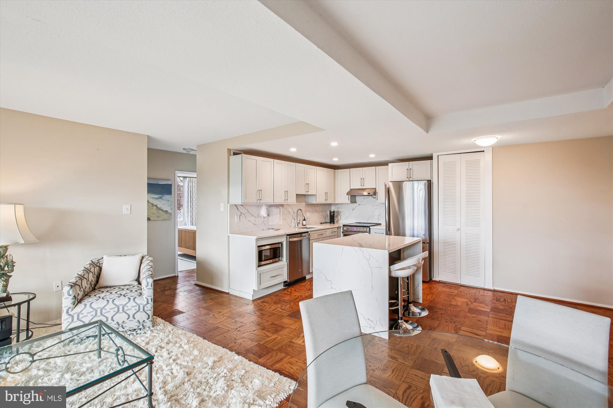 1311 Delaware Avenue Southwest, Unit S331 Washington, DC 20024 - Photo 12 of 35 a living room with stainless steel appliances furniture and kitchen view