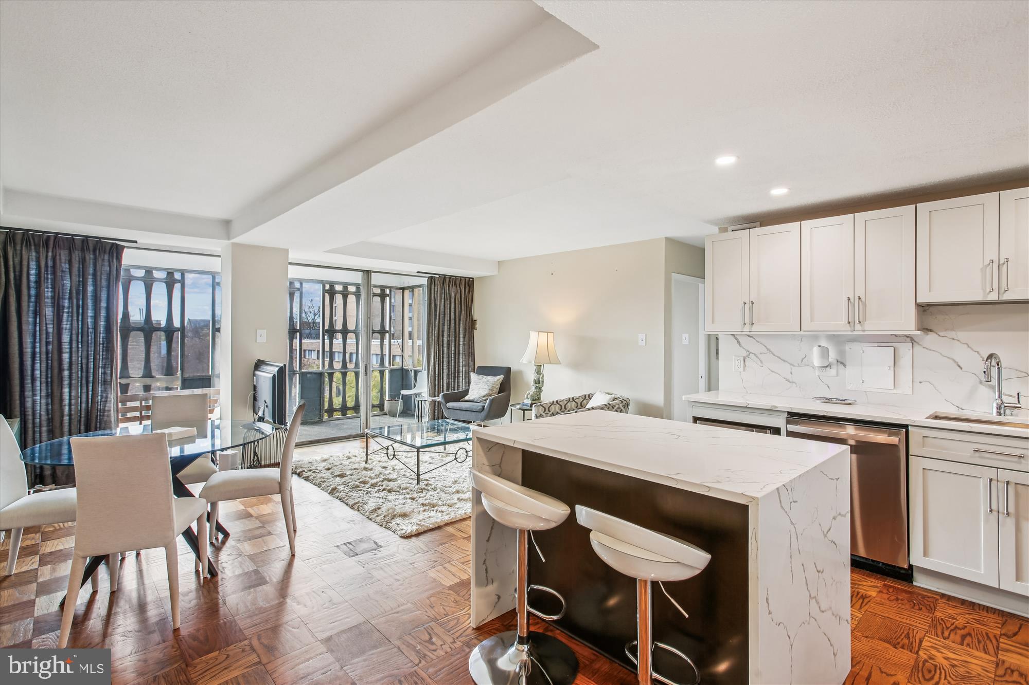 1311 Delaware Avenue Southwest, Unit S331 Washington, DC 20024 - Photo 2 of 35 a view of a dining room with furniture and wooden floor