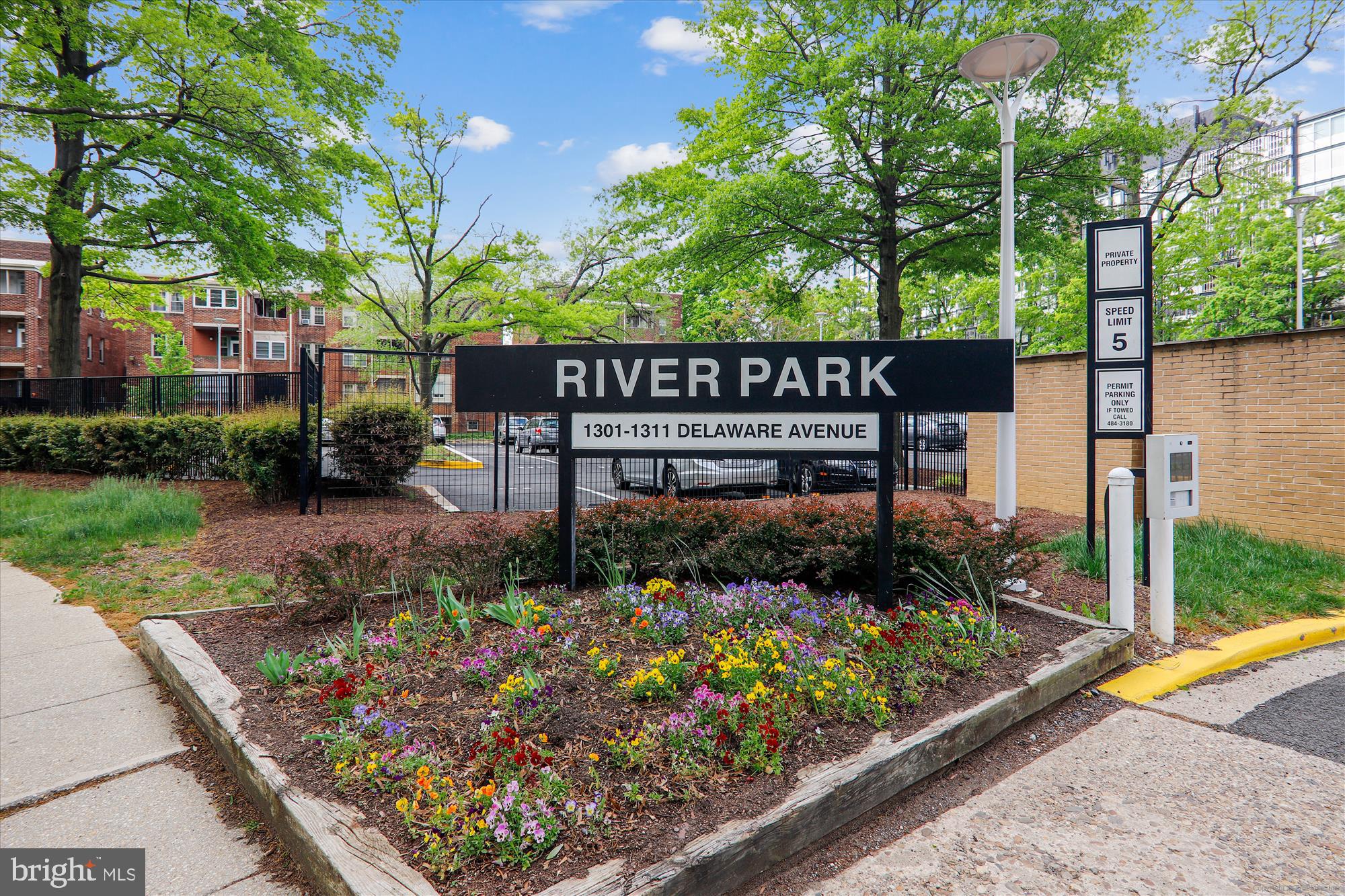 1311 Delaware Avenue Southwest, Unit S331 Washington, DC 20024 - Photo 29 of 35 a view of a bench sitting in a backyard