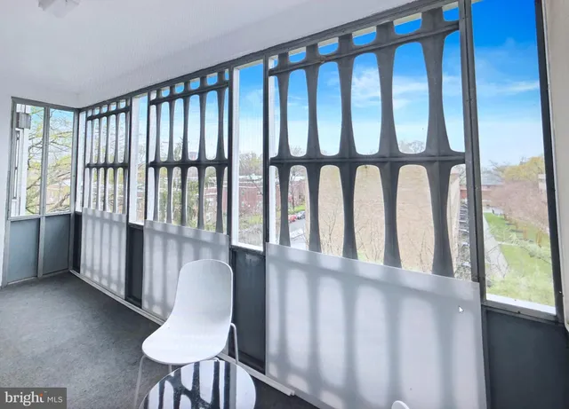 a view of a porch with furniture