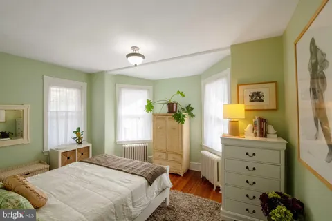 a bedroom with a bed and furniture