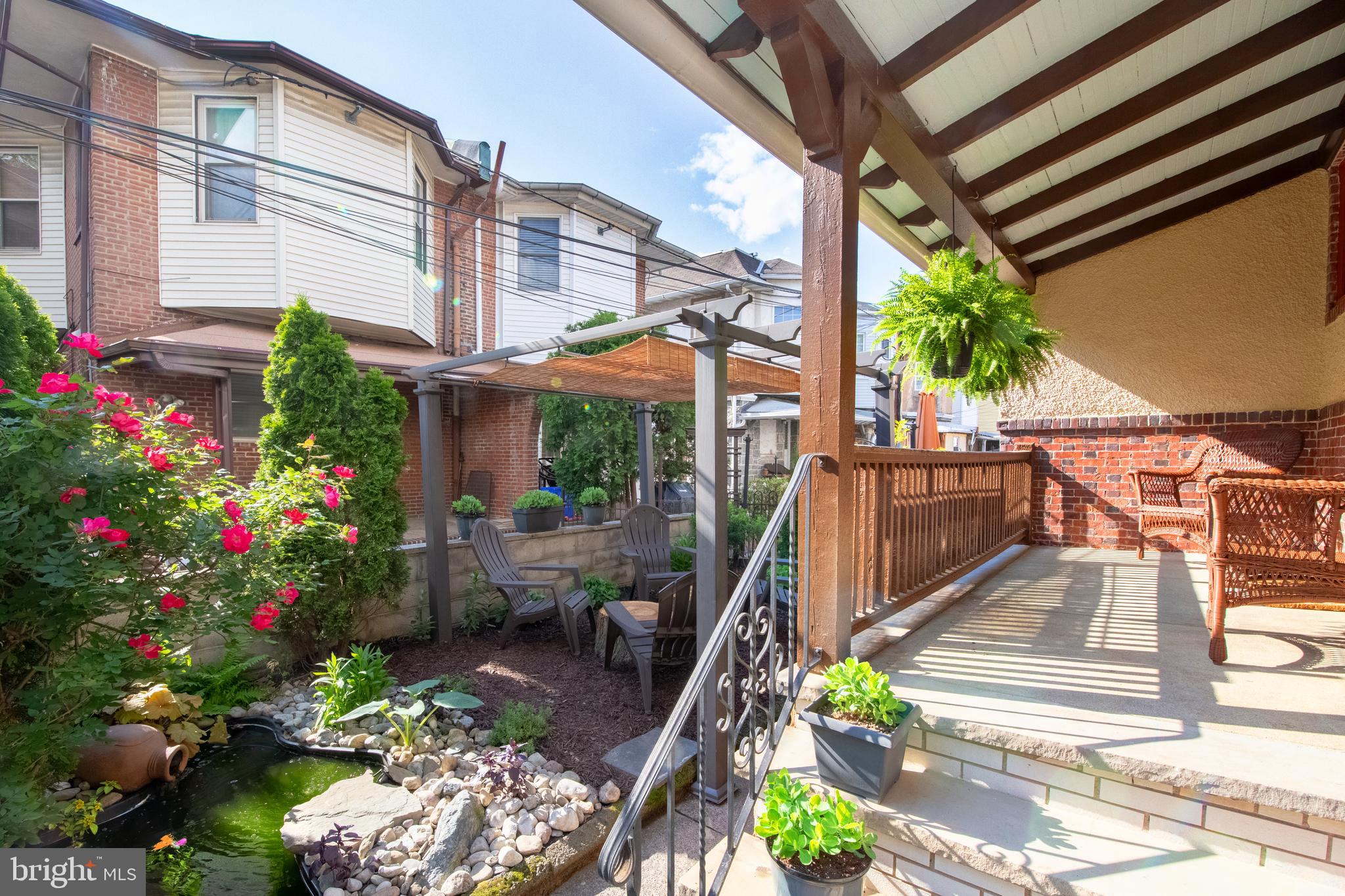 2526 South Cleveland Street Philadelphia, PA 19145 - Photo 6 of 29 a view of a chairs and table in the backyard