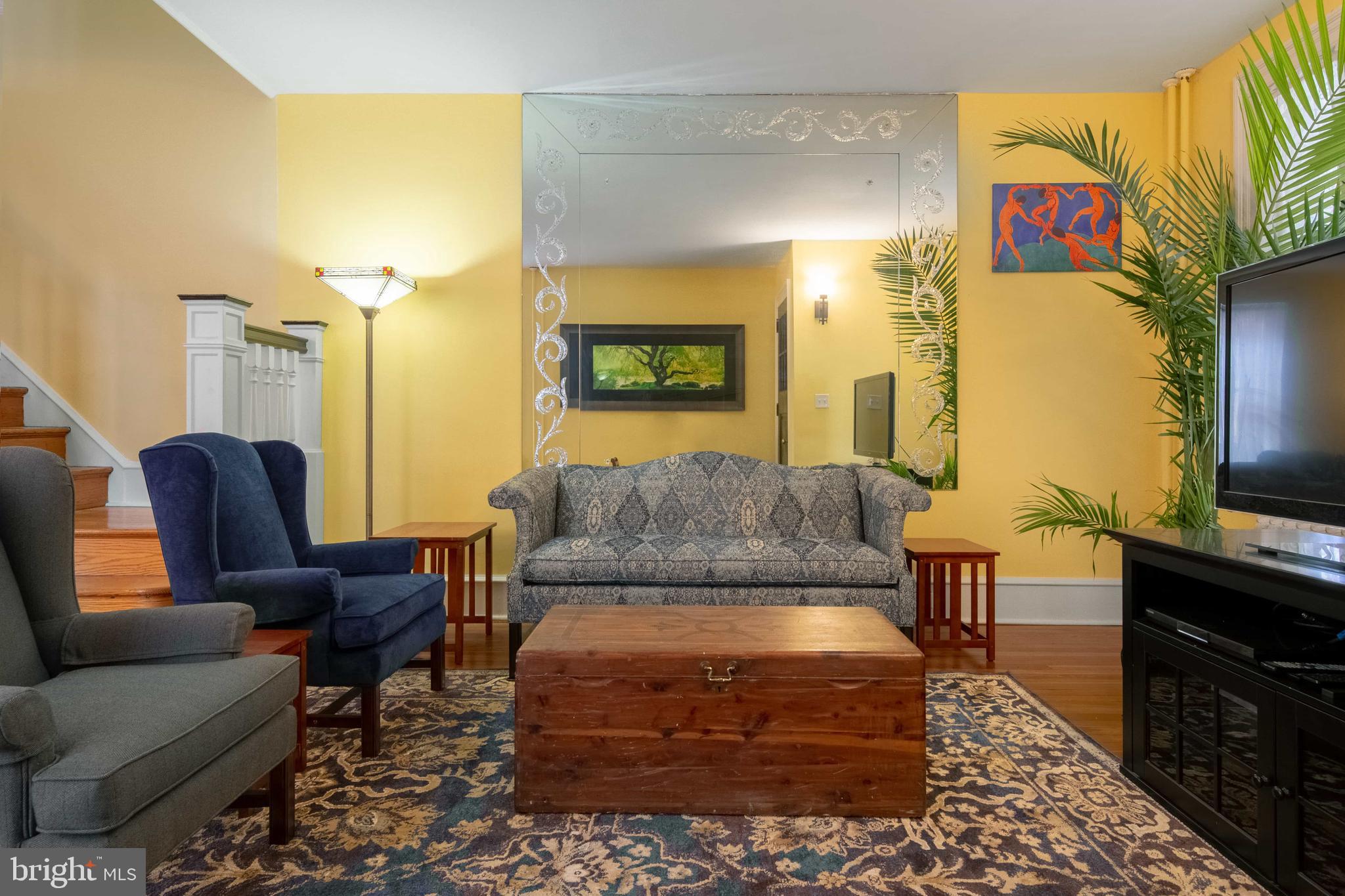 2526 South Cleveland Street Philadelphia, PA 19145 - Photo 10 of 29 a living room with furniture and a flat screen tv
