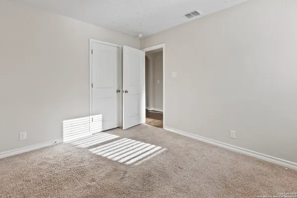 an empty room with windows