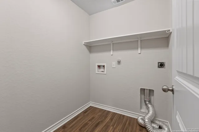 a view of small space with racks on the wall