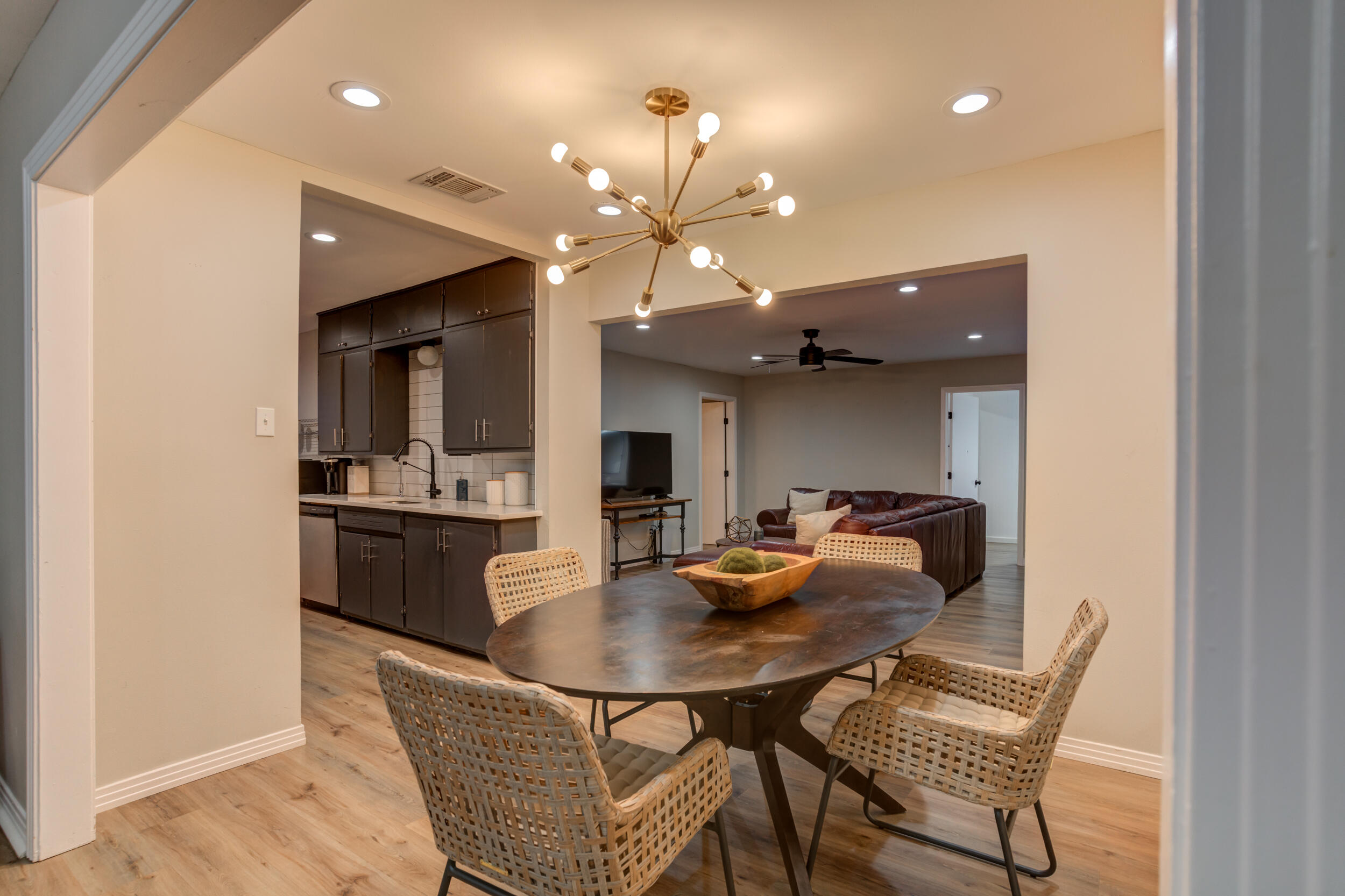 2802 39th Street Lubbock, TX 79413 - Photo 11 of 61 a dining room with furniture and chandelier