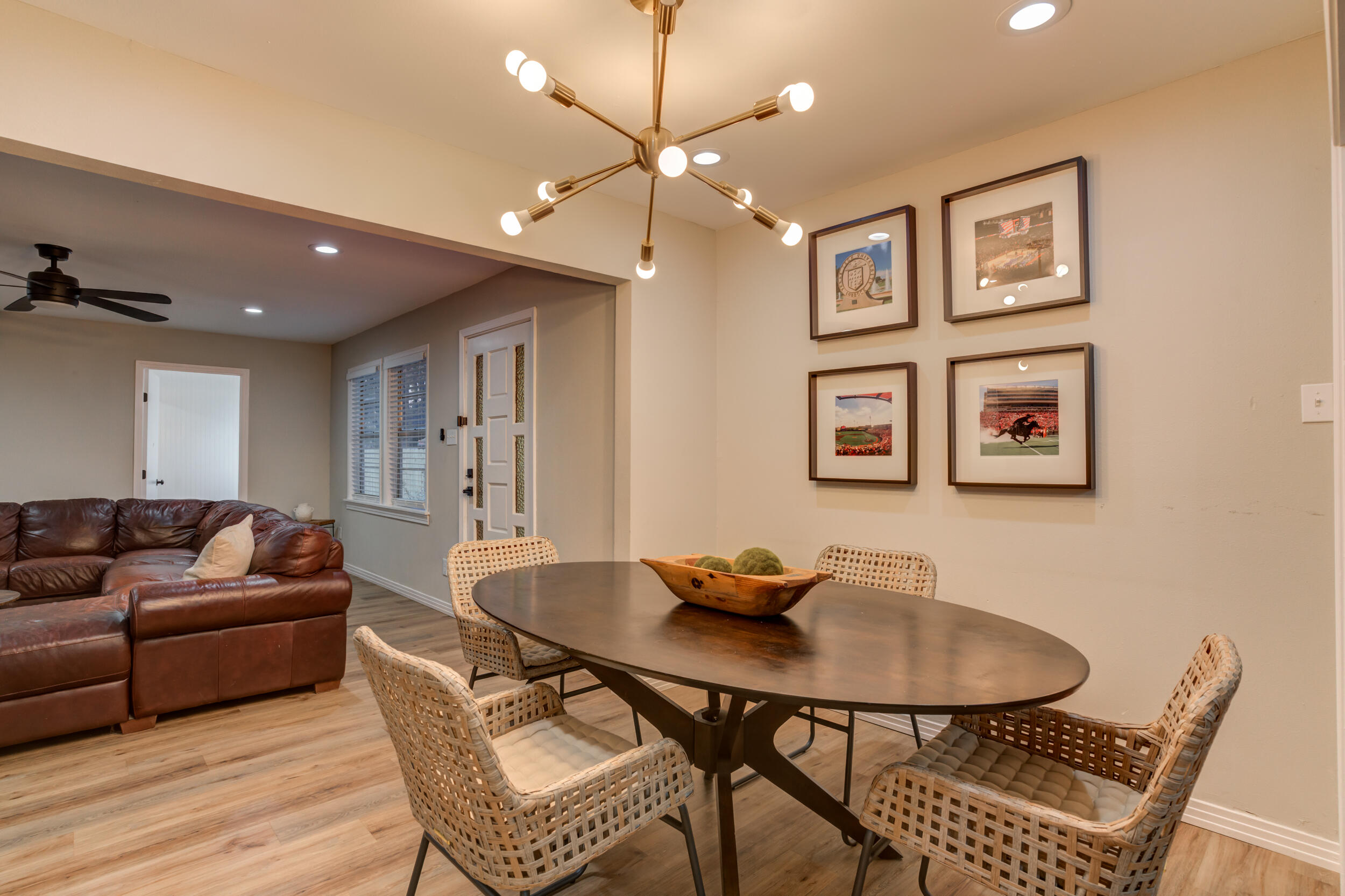2802 39th Street Lubbock, TX 79413 - Photo 13 of 61 a living room with furniture and a table