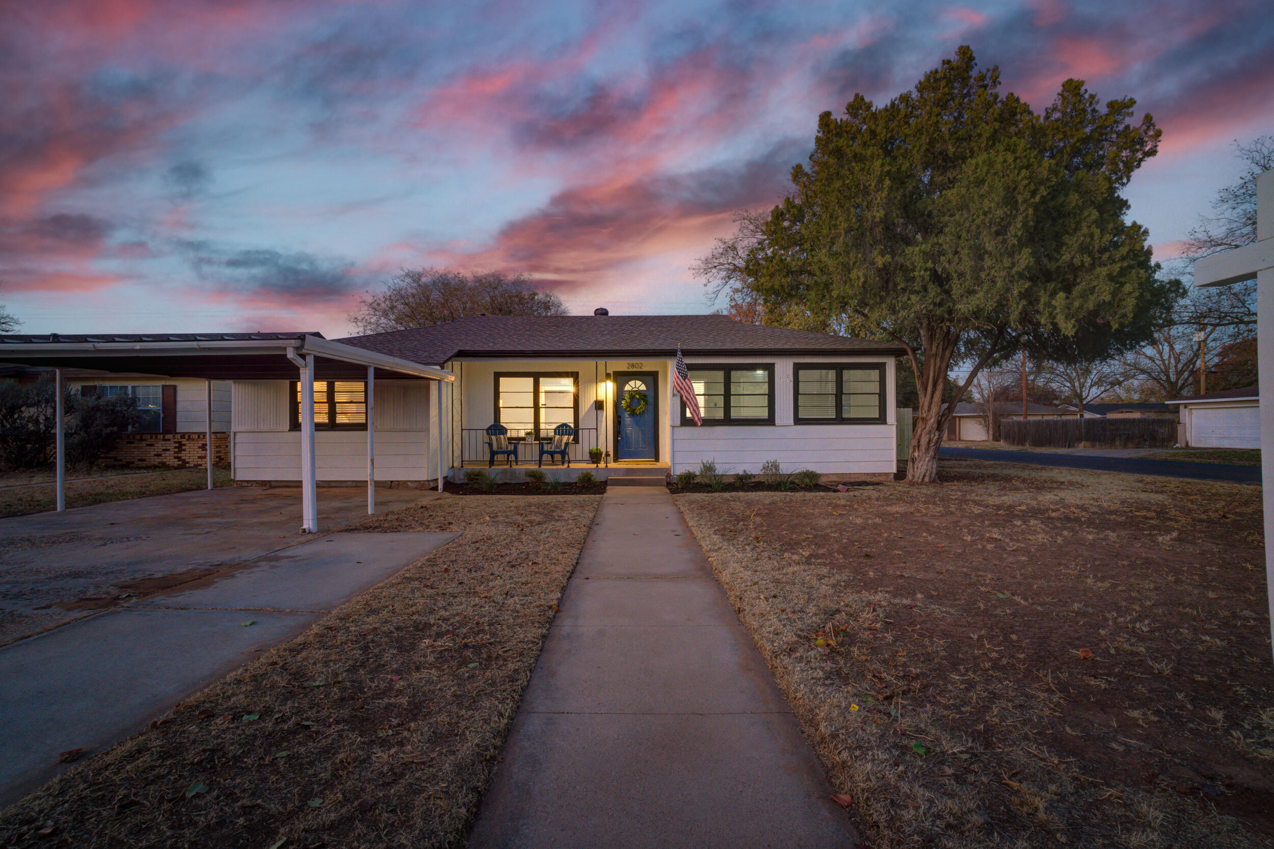 2802 39th Street Lubbock, TX 79413 - Photo 2 of 61 front view of a house with a yard